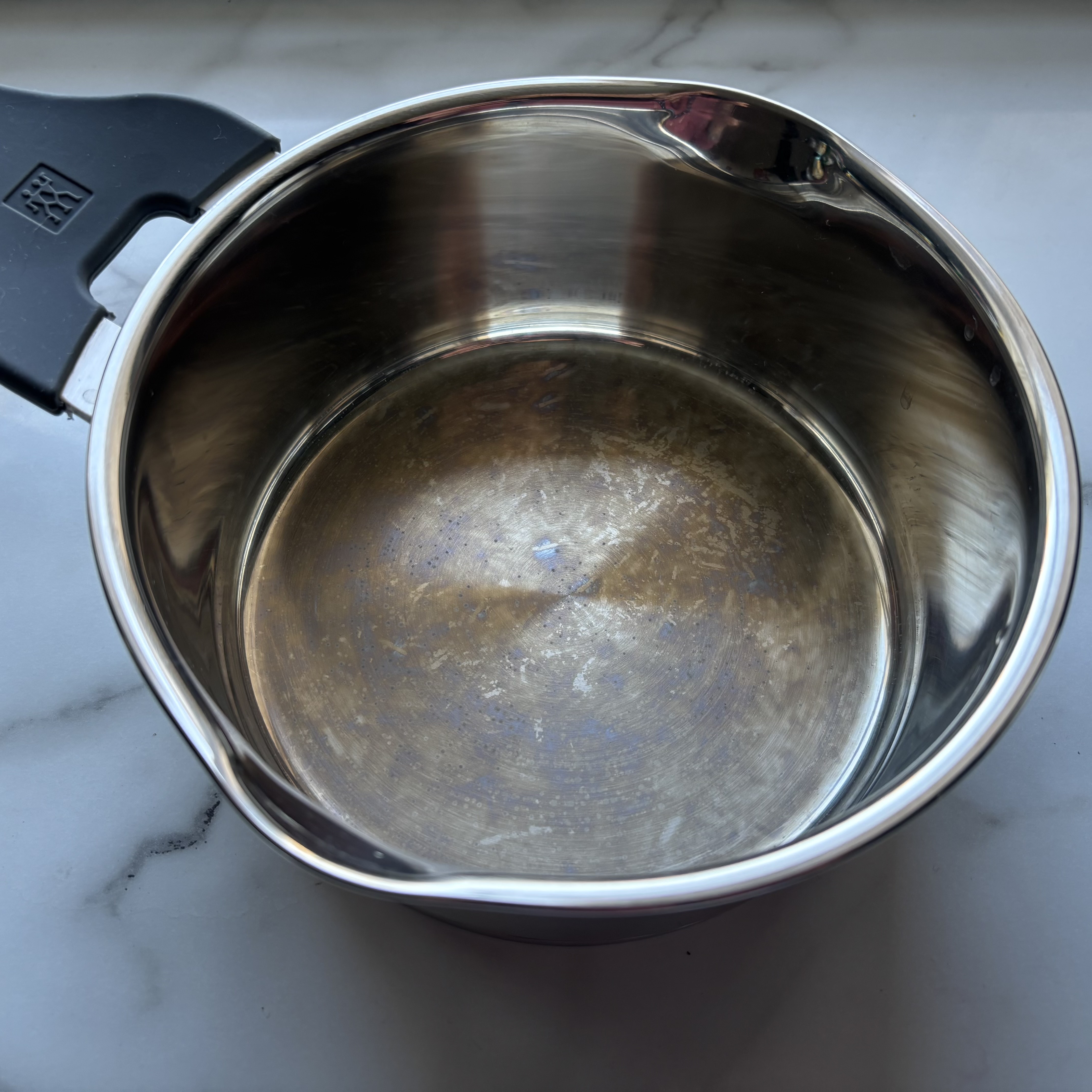 The Zwilling Simplify saucepan after being cleaned.