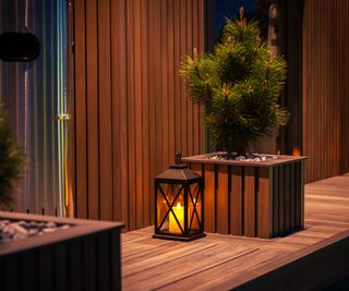 A solar lantern on a deck