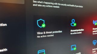 Windows virus and threat protection, with "no action needed" specified