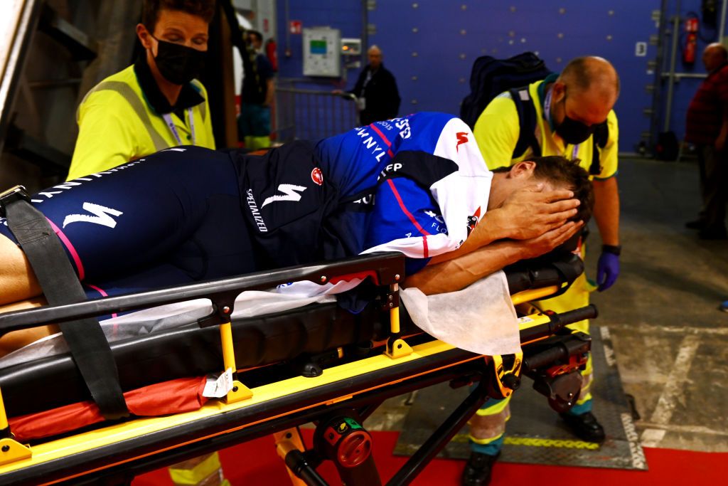 Stijn Steels of Belgium and Team Caruur is treated by the medical service after his fall during the Gent Six Day 2022