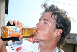 Carlos Betancur gets in some much-needed rehydration after his win