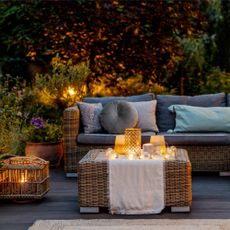 cozy patio with couch and lights