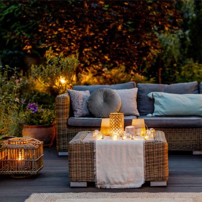 cozy patio with couch and lights