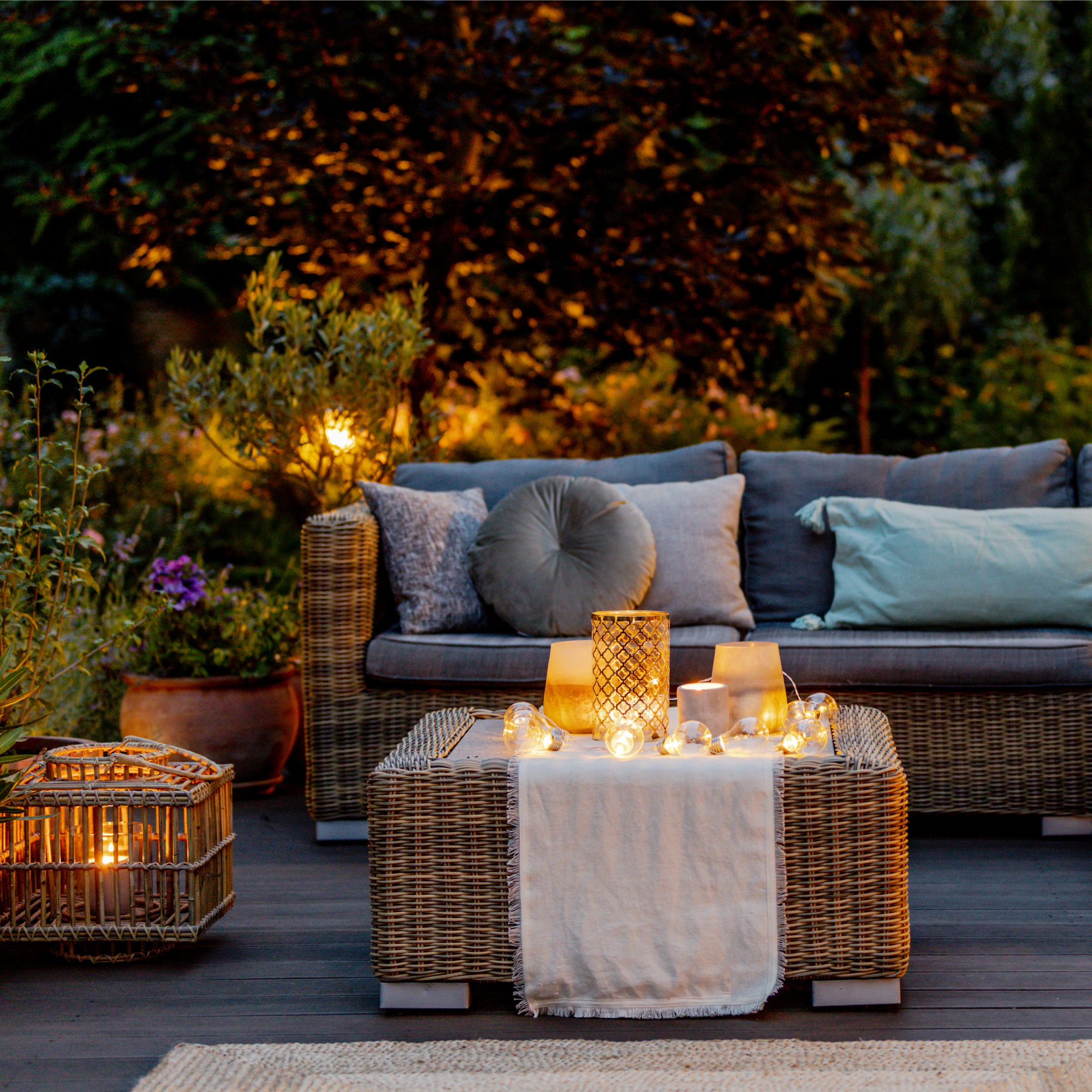 cozy patio with couch and lights
