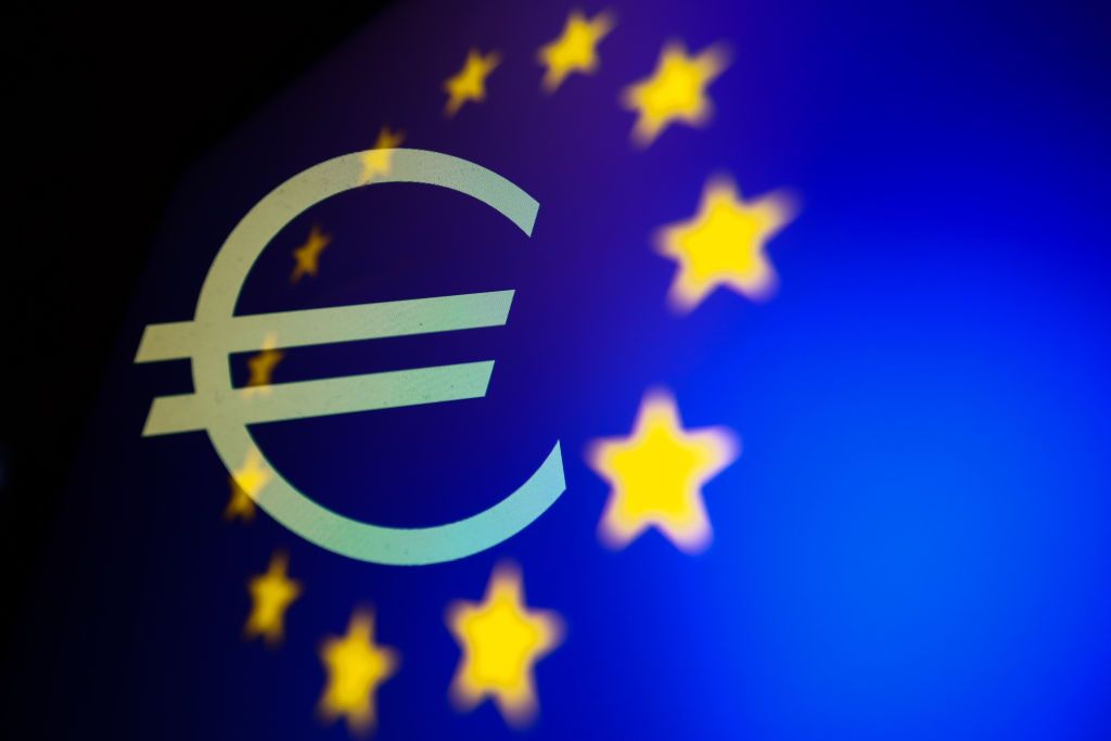 Euro currency symbol displayed on a screen with European Union flag