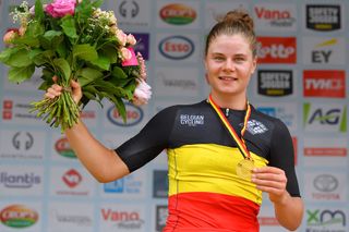 WAREGEM BELGIUM JUNE 20 Lotte Kopecky of Belgium Gold Medal Belgian Champion Jersey celebrates at podium during the 122th Belgian Road Championship 2021 Womens Road Race a 1224km one day race from Waregem to Waregem BELCycling belgiancycling on June 20 2021 in Waregem Belgium Photo by Luc ClaessenGetty Images