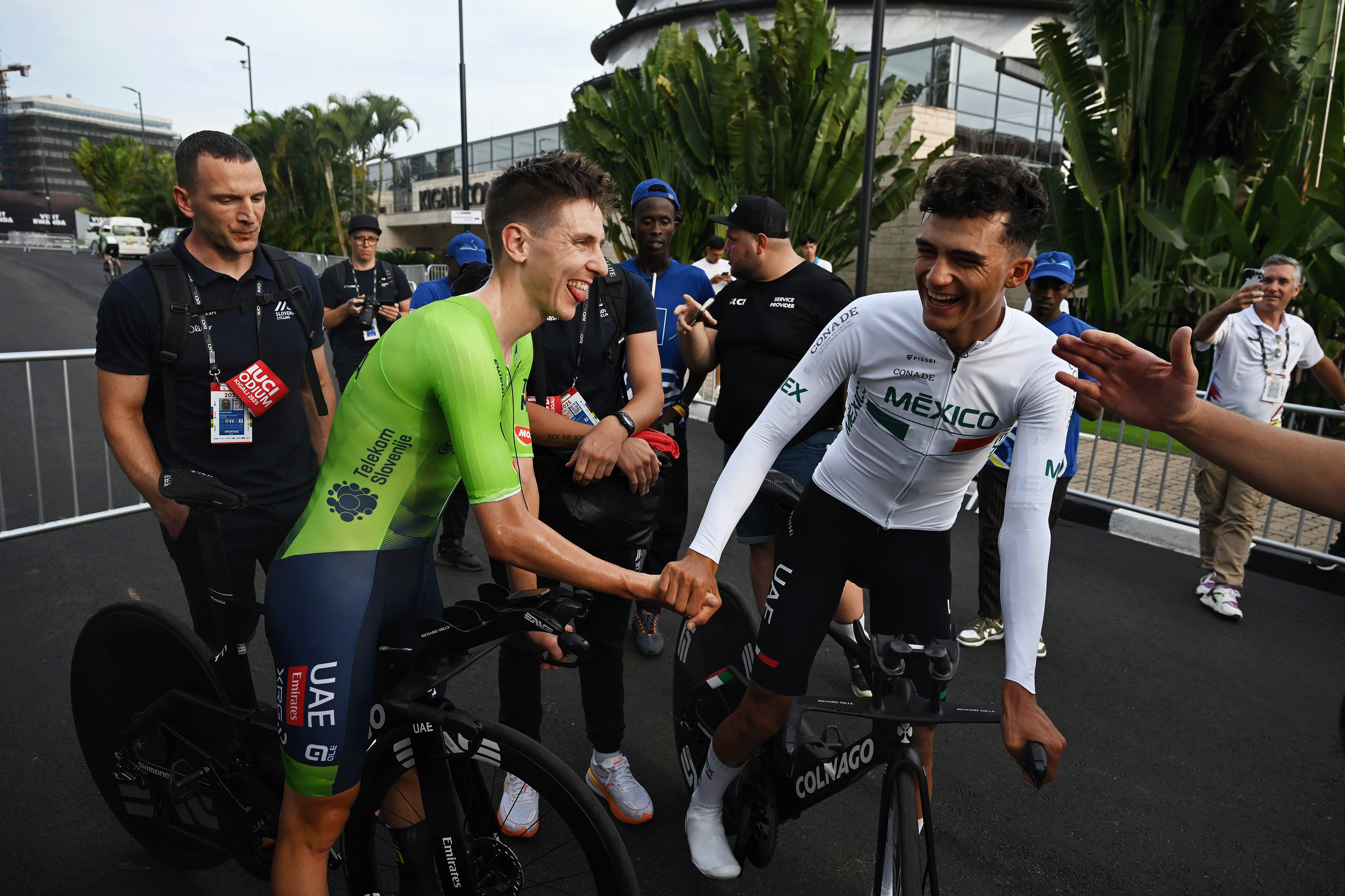 KIGALI, RWANDA - SEPTEMBER 21: (L-R) Tadej Pogacar of Team Slovenia and Isaac Del Toro of Team Mexico react after the 98th UCI Cycling World Championships Kigali 2025 - Men Elite Individual Time Trial a 40.6km race from Kigali to Kigali on September 21, 2025 in Kigali, Rwanda. (Photo by Dario Belingheri/Getty Images)