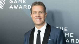 Geoff Keighley smiles for a photo as he arrives at The Game Awards 2017.