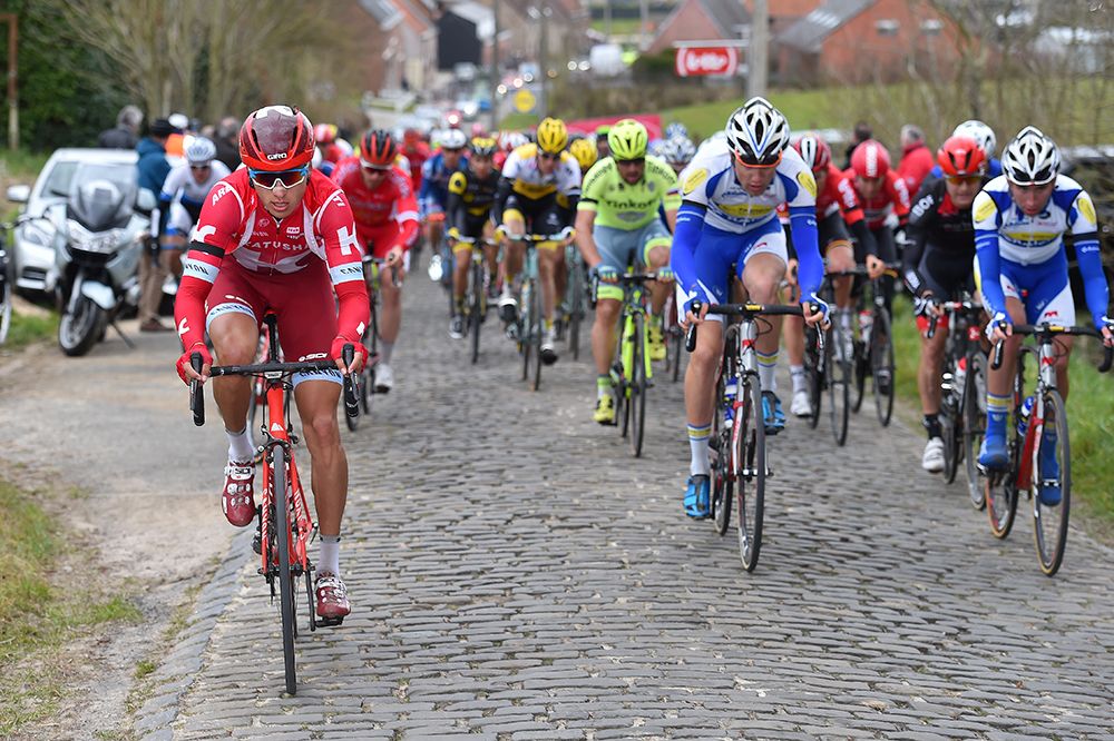 Vyacheslav Kuznetsov (Katusha) looks for a smooth path through the cobbles