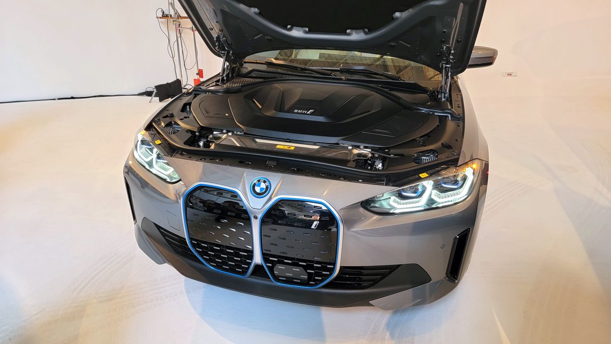 Under the hood of a car in a showroom