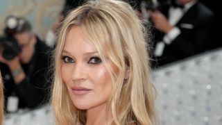 Kate Moss styling out one of the fall makeup looks, diamond skin