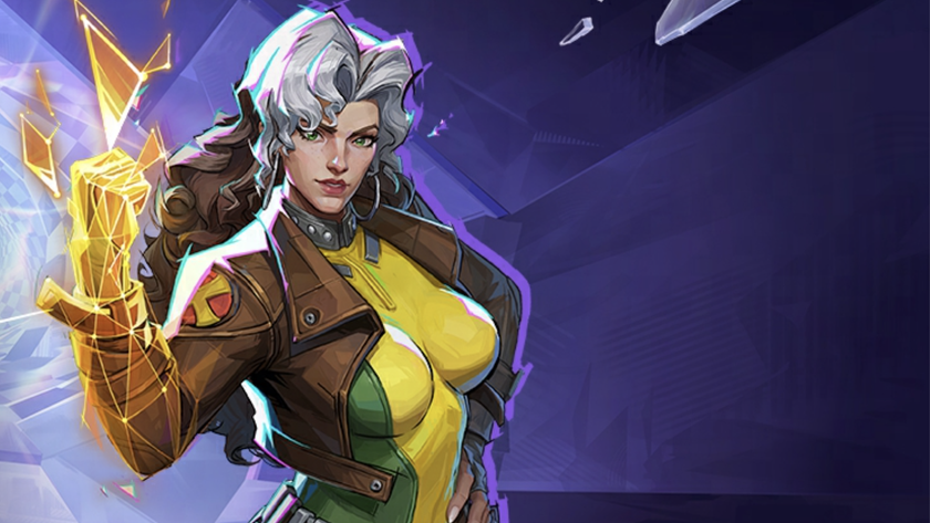 Rogue poses, holding up a fist covered in golden energy