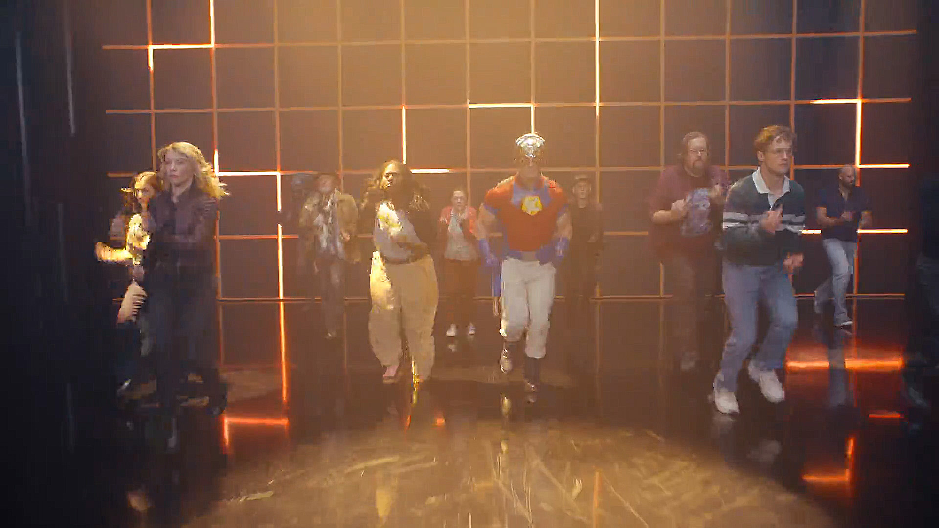 The cast of Peacemaker jogging during season 2's opening dance number