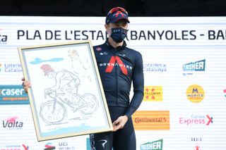 PLA DE LESTANY BANYOLES SPAIN MARCH 23 Podium Rohan Dennis of Australia and Team INEOS Grenadiers Celebration during the 100th Volta Ciclista a Catalunya 2021 Stage 2 a 185km Individual Time Trial stage from Pla de LEstany Banyoles to Pla de LEstany Banyoles 145m ITT Trophy Mask Covid Safety Measures VoltaCatalunya100 on March 23 2021 in Pla de LEstany Banyoles Spain Photo by David RamosGetty Images