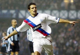 Nacho Novo celebrates after scoring for Rangers against Dundee in 2004.