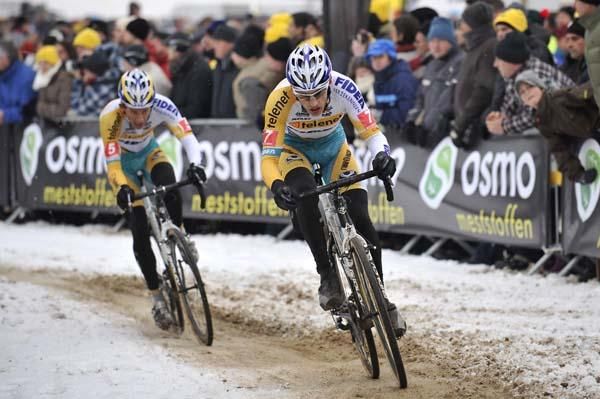 Rob Peeters and Tom Meeusen chase after the leader.