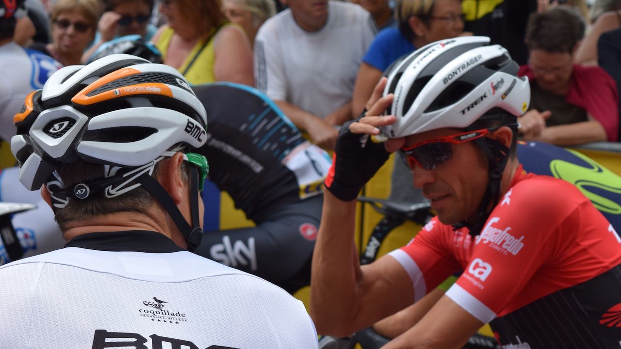 Alberto Contador shows off his new Bontrager helmet to Irish national champion Nico Roche