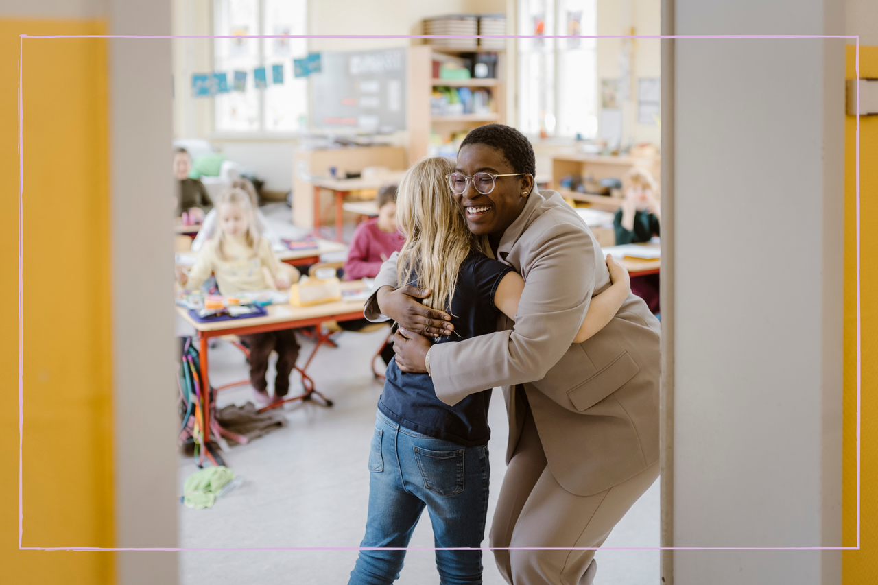 Teacher embracing student after receiving a Christmas gift