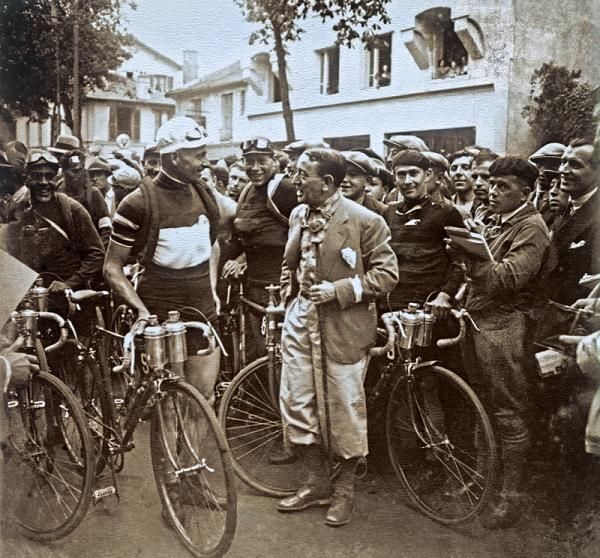 This photo shows Alfredo Binda at the start of one stage of the Tour from 1930, the crowd gathers to farewell the heroes of the Tour de France. Champion of the Giro d&rsquo;Italia, Binda won the eighth and queen stage, stage nine, over the Tourmalet before abandoning in the 10th.