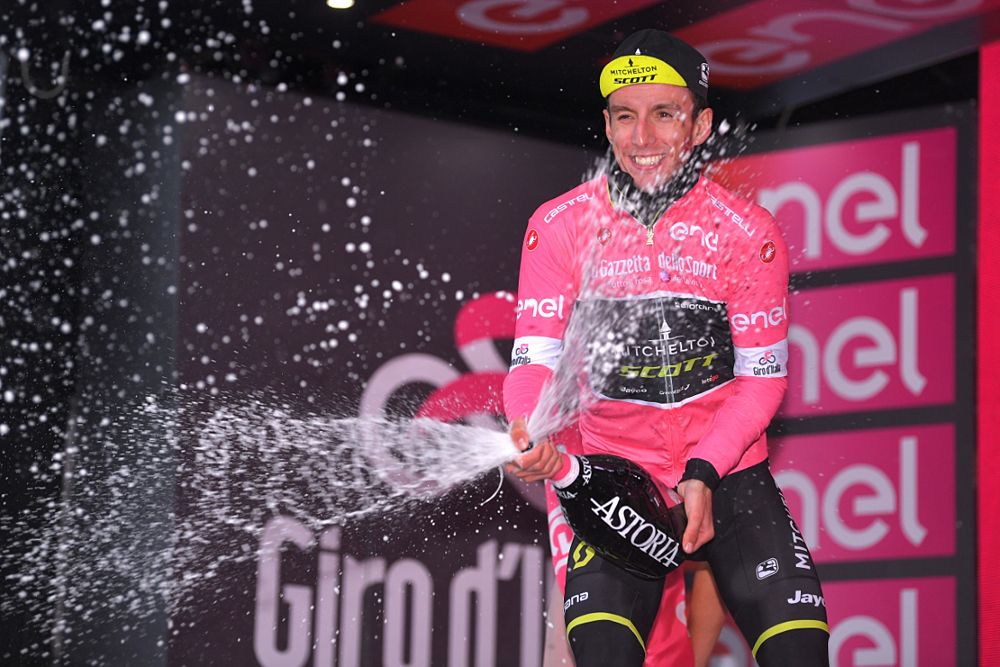 Simon Yates (Mitchelton-Scott) celebrates his maglia rosa lead after stage 12 at the Giro d'Itlaia