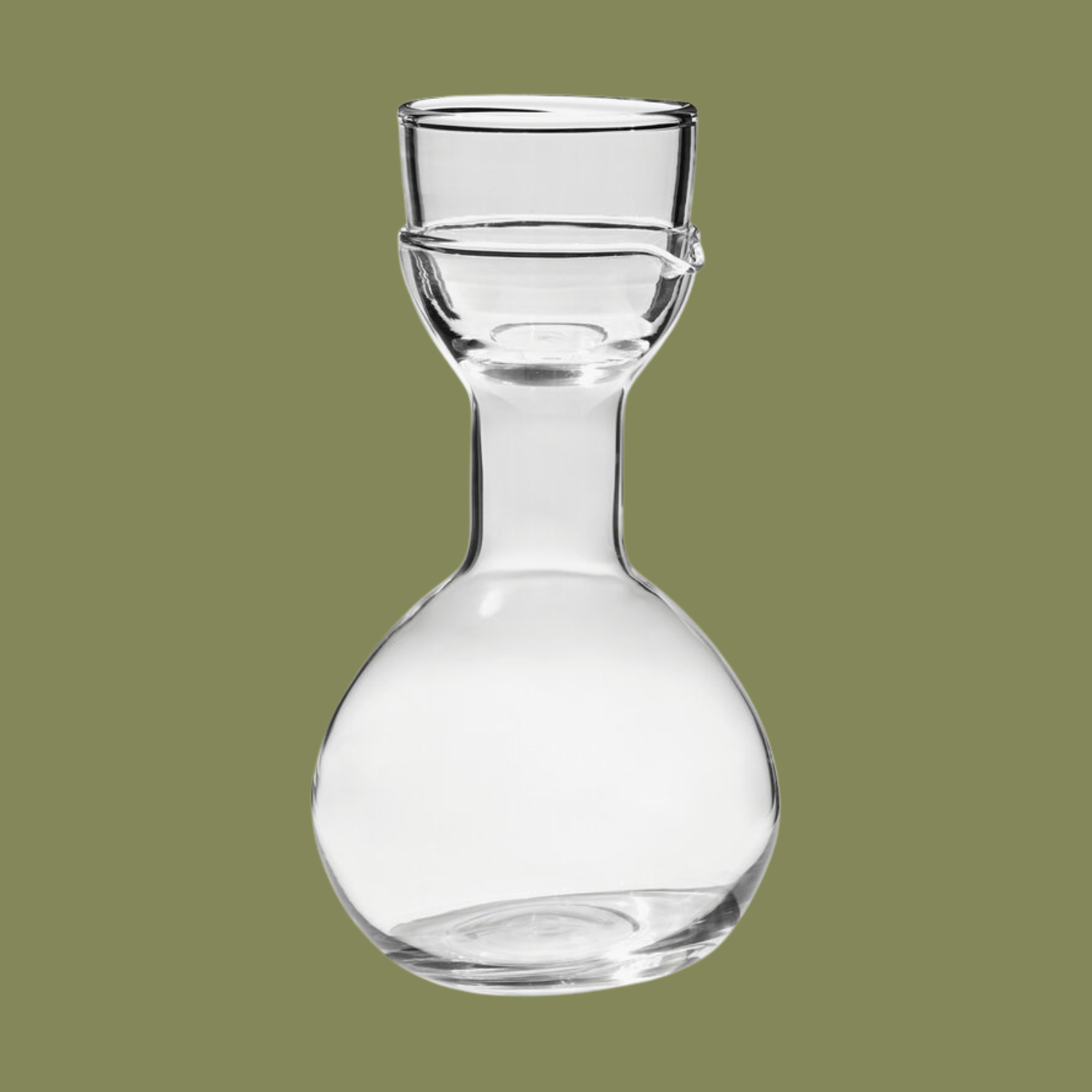 A carafe and glass set
