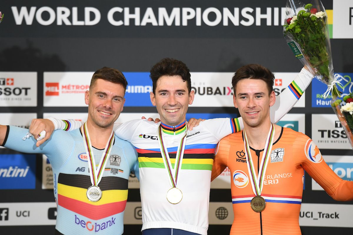 Picture by Simon Wilkinson/SWpix.com - 22/10/2021 - Cycling - Tissot 2021 UCI Track Cycling World Championships - Men's Points Race - Stab Velodrome, Roubaix, France - Podium - France's Benjamin Thomas takes gold and the rainbow jersey after winning the men's points race with Belgium's Kenny de Ketele taking silver &amp; The Netherlands's Vincent Hoppezak taking bronze.