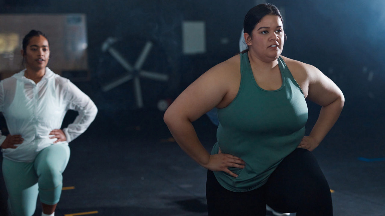 Woman performing reverse lunge
