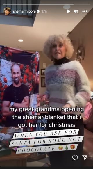 Instagram Story of Shemar Moore's great grandmother reacting to a blanket with his face on it for Christmas.