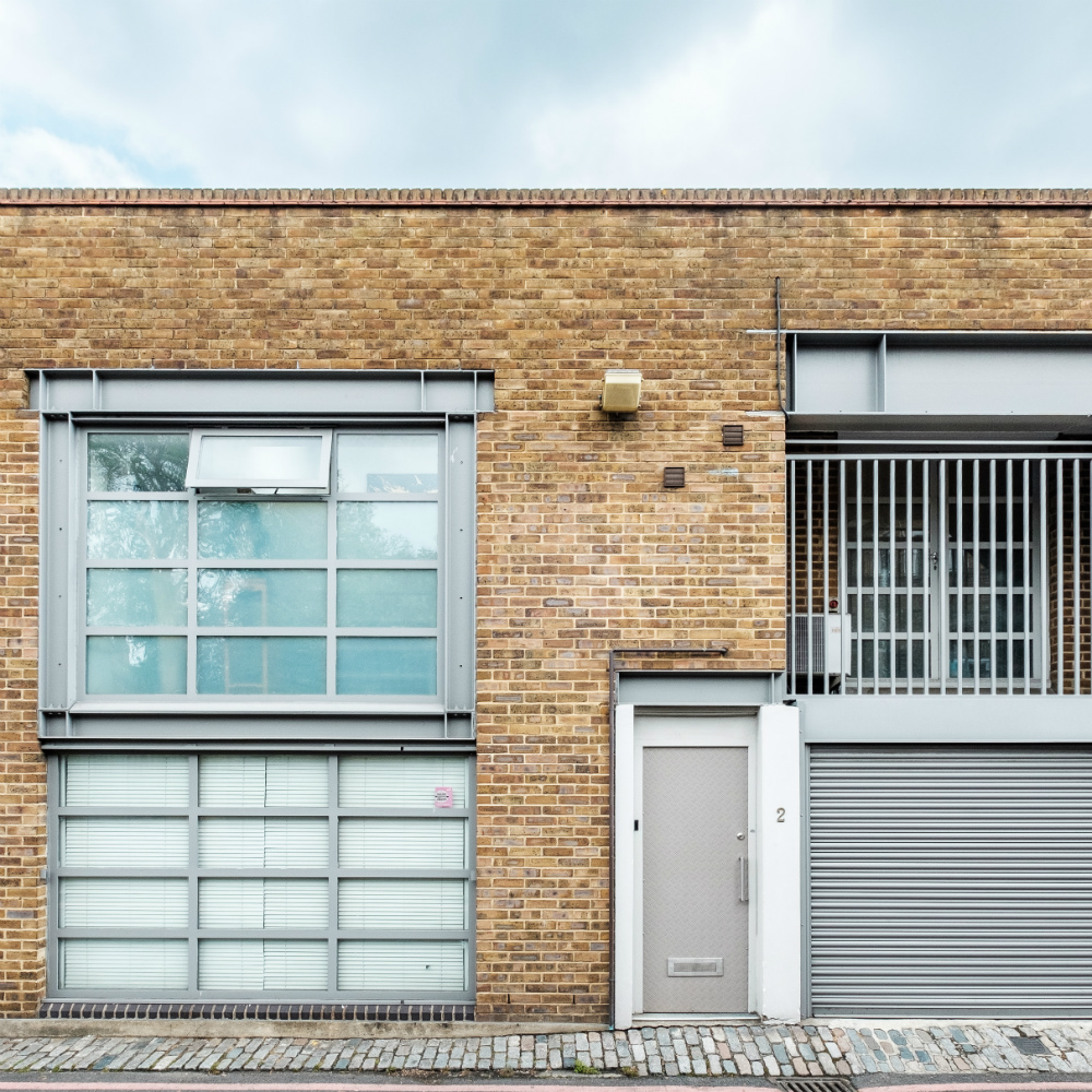 exterior with brick house and glass window