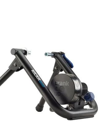 A Wahoo Kickr Snap turbo trainer standing against a white background