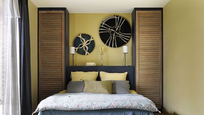 Yellow painted bedroom with natural daylight