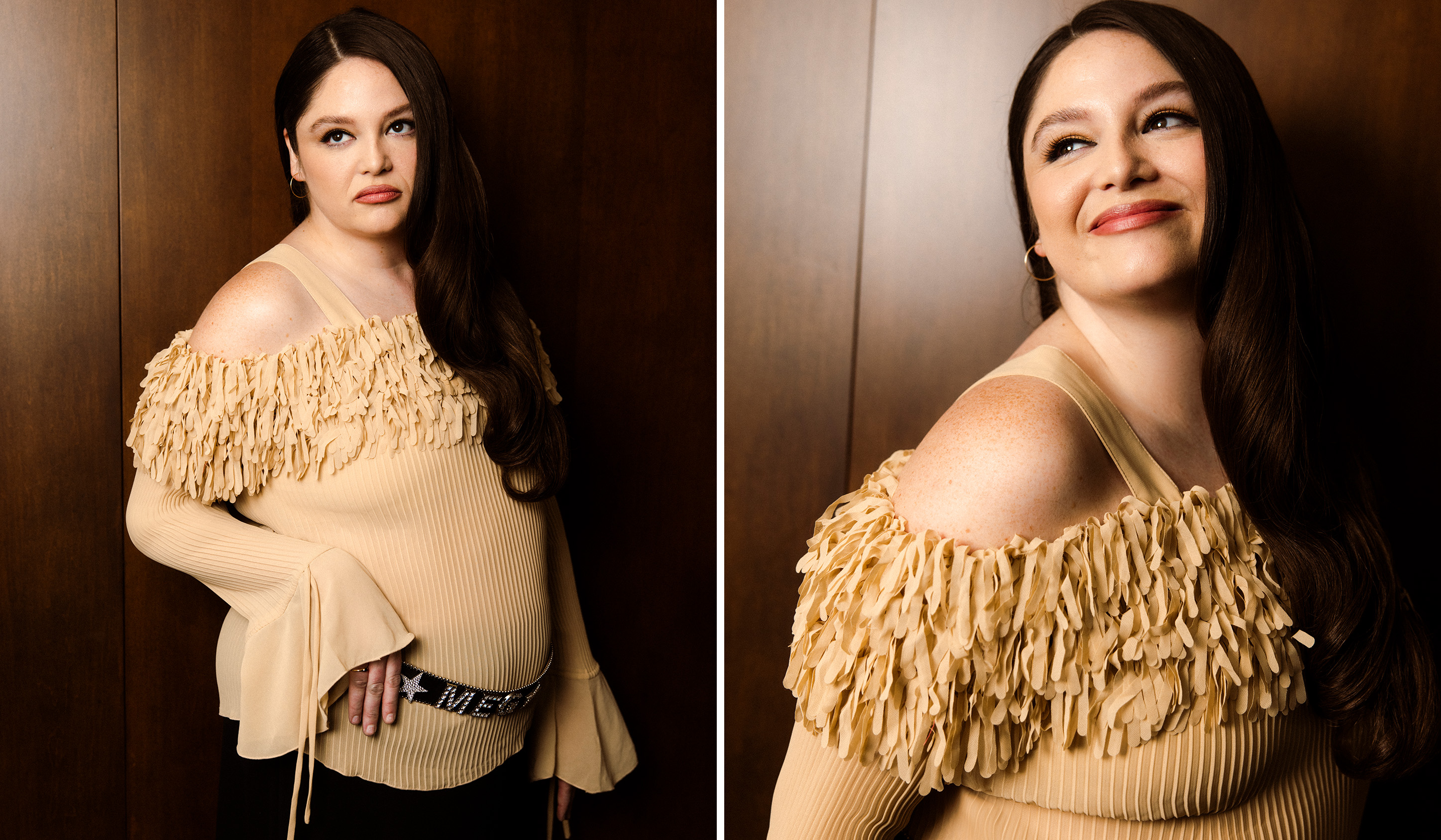 Meg Stalter wears an off the shoulder shaggy sweater looking over her shoulder frowning and smiling in a split image