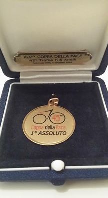 The organisers of the Coppa della Pace visited Keagan Girdlestone in hospital to present him with a winner's medal.