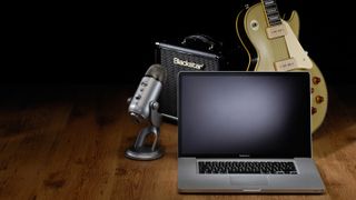 A MacBook Pro laptop with musical equipment