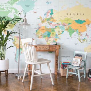 Playroom with wall map decal and desk