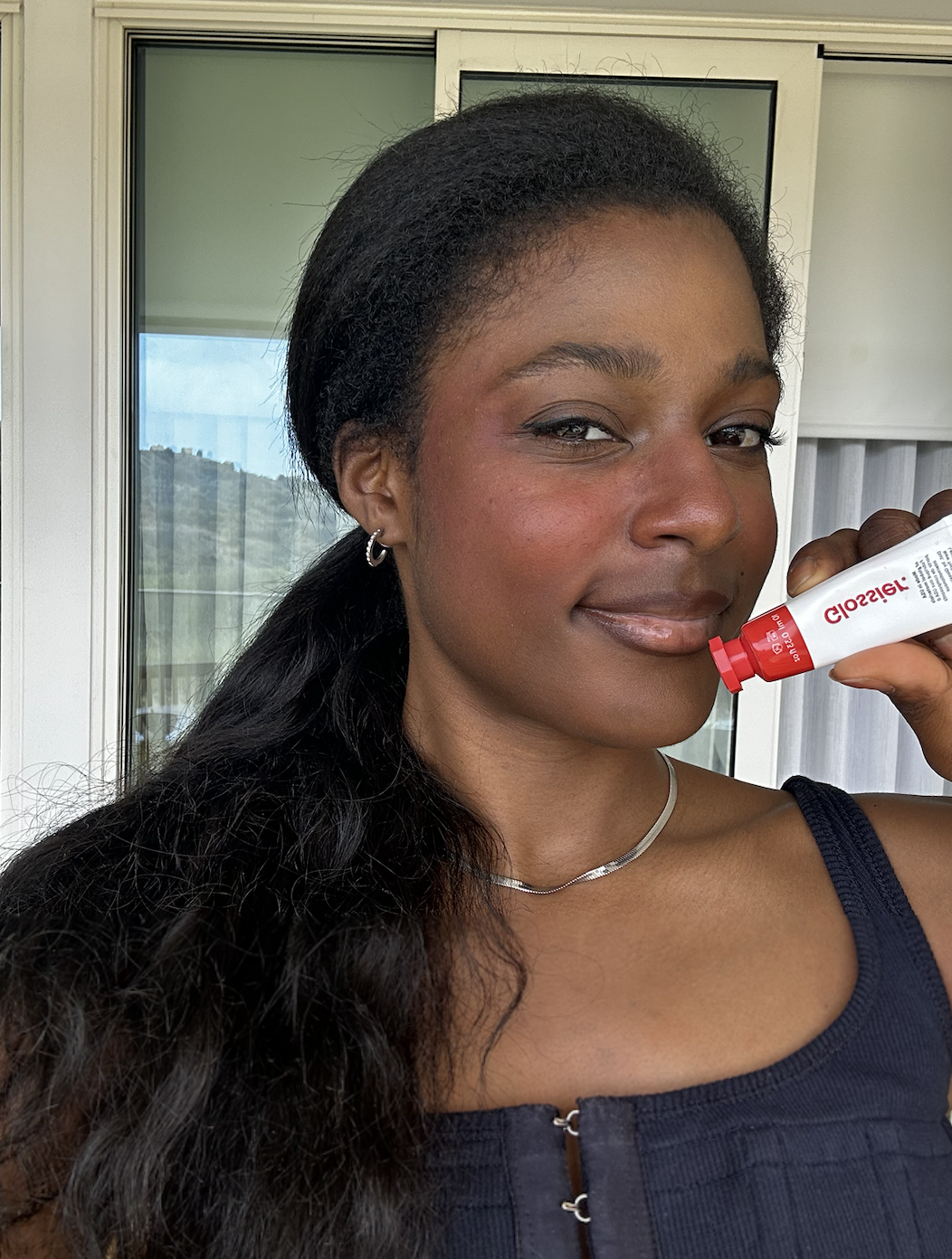 Shei Mamona wearing Glossier Blusher