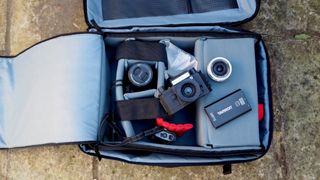 Manfrotto Manhattan Runner 50 camera bag open and filled with camera equipment