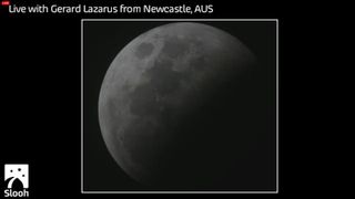 Skywatcher Gerard Lazarus of Newcastle, Australia, captured this view of the total lunar eclipse of Oct. 8, 2014 as the moon was heading toward totality as it passed through Earth's shadow.