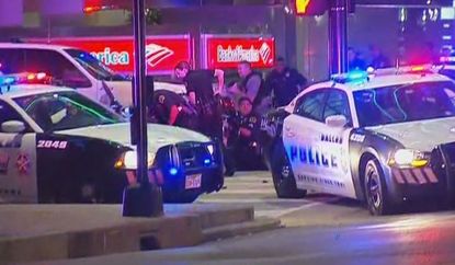 Police officers in downtown Dallas Thursday night.