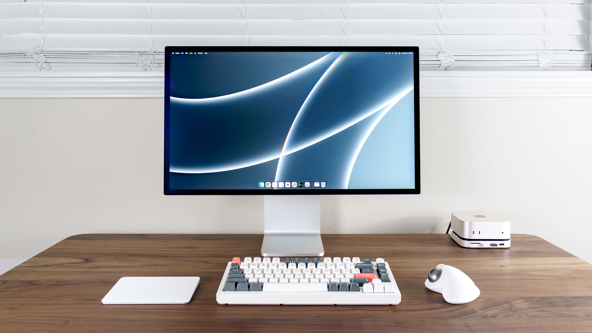 The Apple Studio Display XDR connected to a Mac mini M4 on a desk