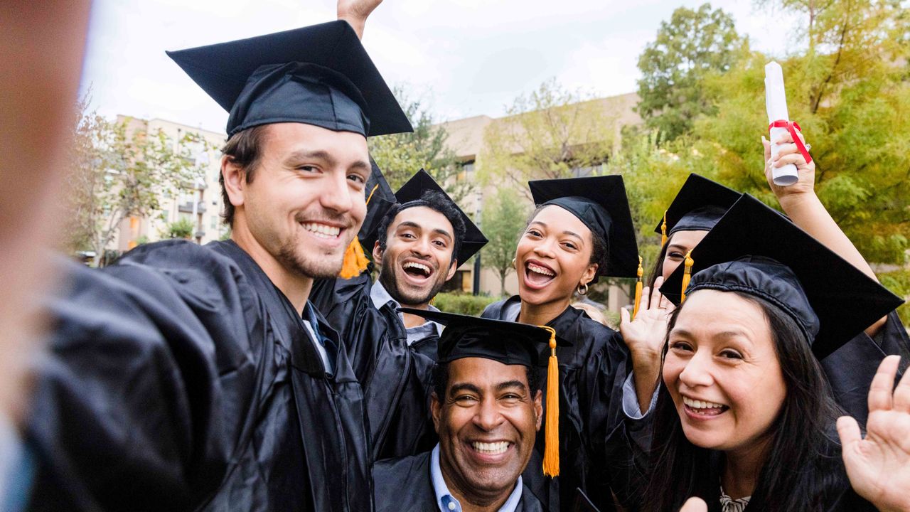 group of college graduates taking a picture