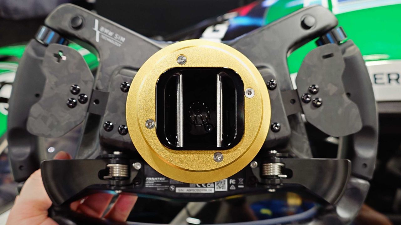 Close-up photos of the Fanatec Podium BMW M4 GT3 racing wheel showing the controls, paddles and mount.