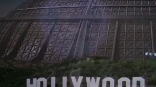 A large dome towers over the Truman Show sign