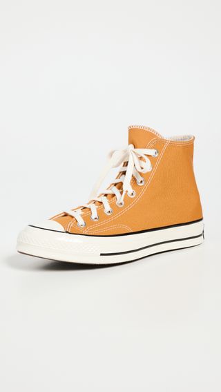 orange high-top Converse sneakers