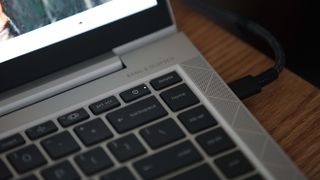 HP EliteBook 840 Aero G8 on a wooden surface