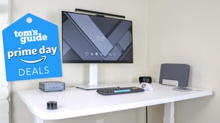 A clean desk setup with a Tom's Guide Prime Day deals badge