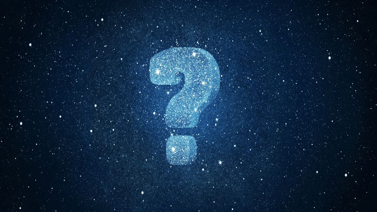 A glowing question mark is made of stars in the night sky