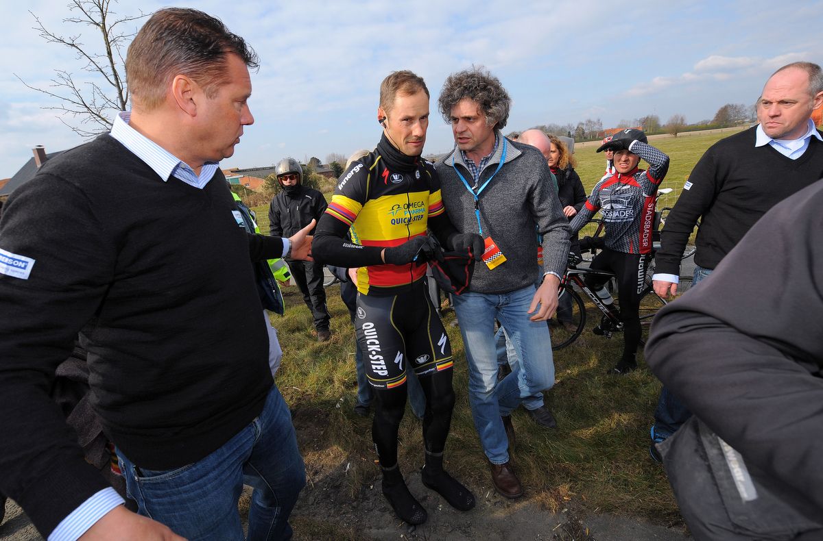 Tom Boonen is helped after crashing out of the 2013 Tour of Flanders