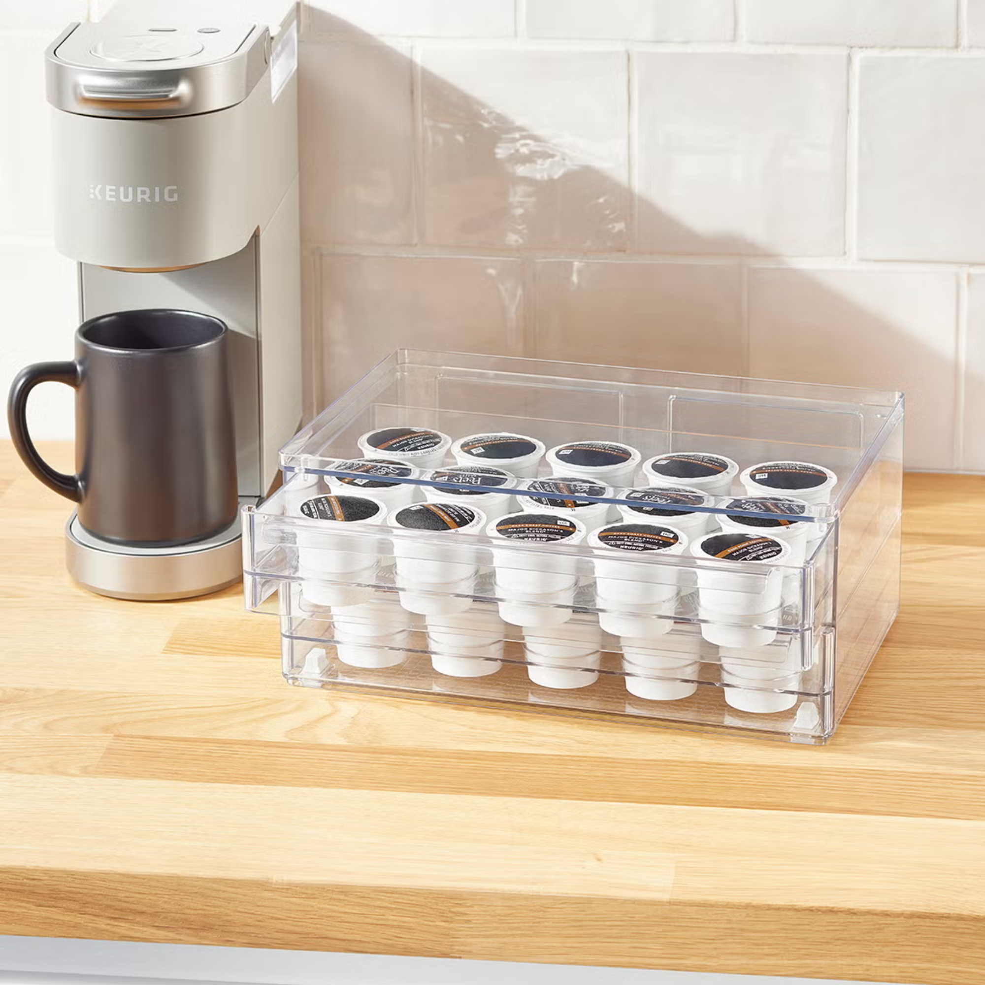 a coffee machine next to coffee storage