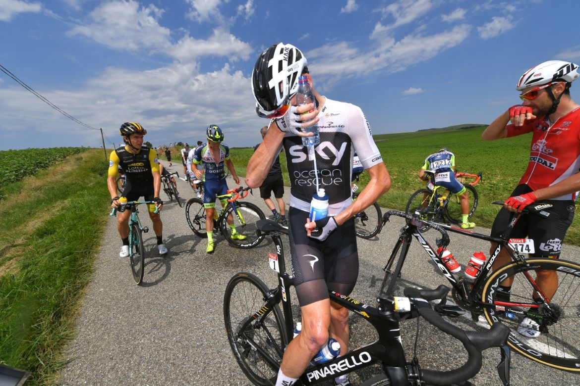 Riders suffered the effects of police pepper spray downwind of a protest that disrupted the race